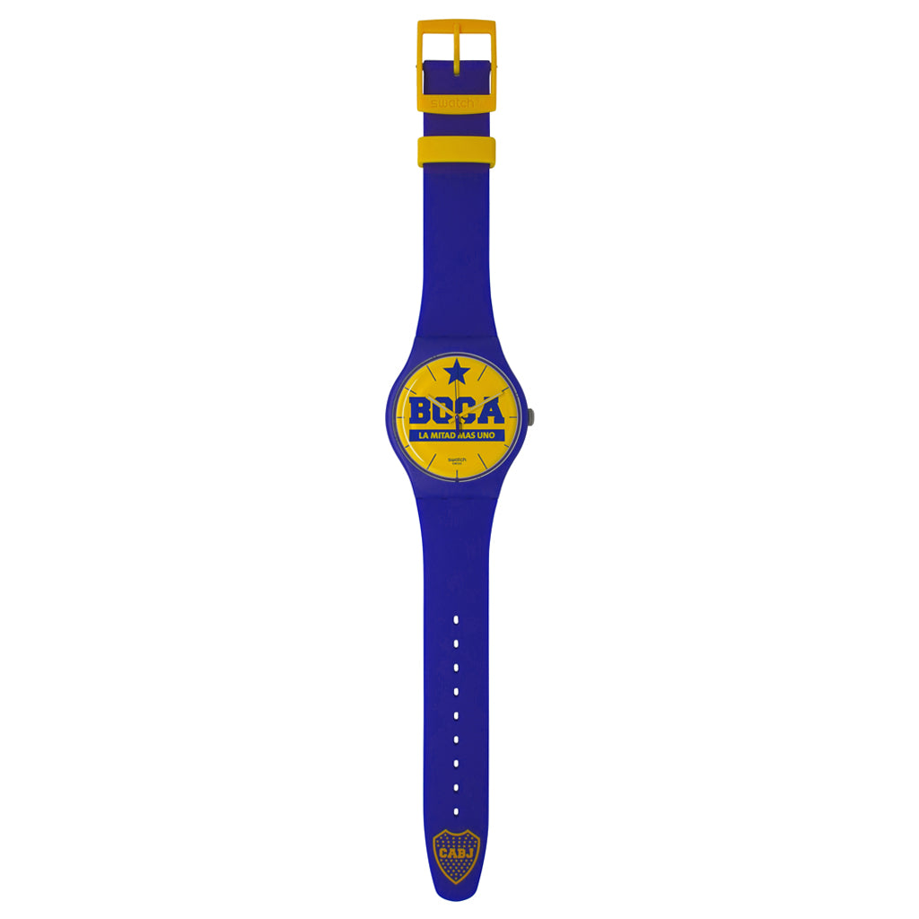 Produktfoto-3 der New Gent Armbanduhr LA MITAD MÁS UNO Set (BOCA) – SUOZ177: Komplette Uhr mit blauem Band und gelbem Zifferblatt mit BOCA‑Motiv.